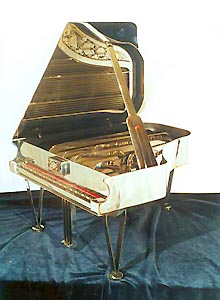 Piano by Dave Regier - stainless steel and red felt, 20" x 24" x 12"
