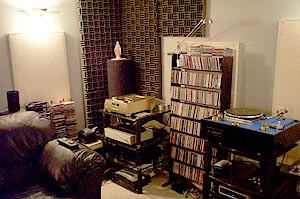 The source corner within reach of the leather couch
